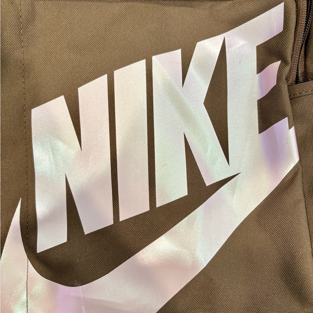 Green background with iridescent Nike Logo